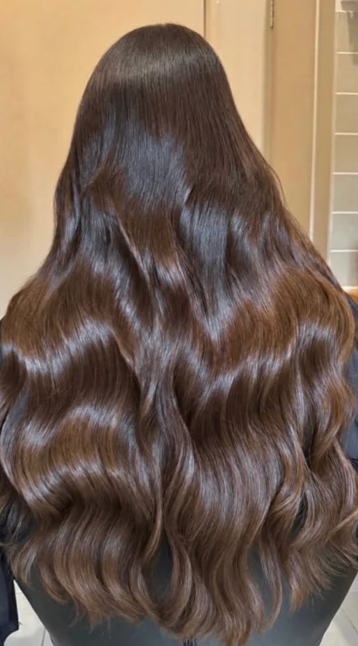 Glossy brunette weft extensions